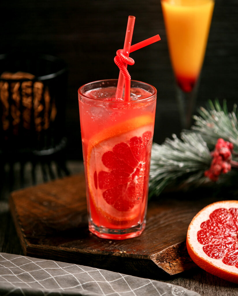 Grapefruit Cocktail With Ice On The Table 